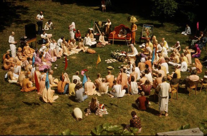 Prabhupāda giving initiations in the garden of the Schloss